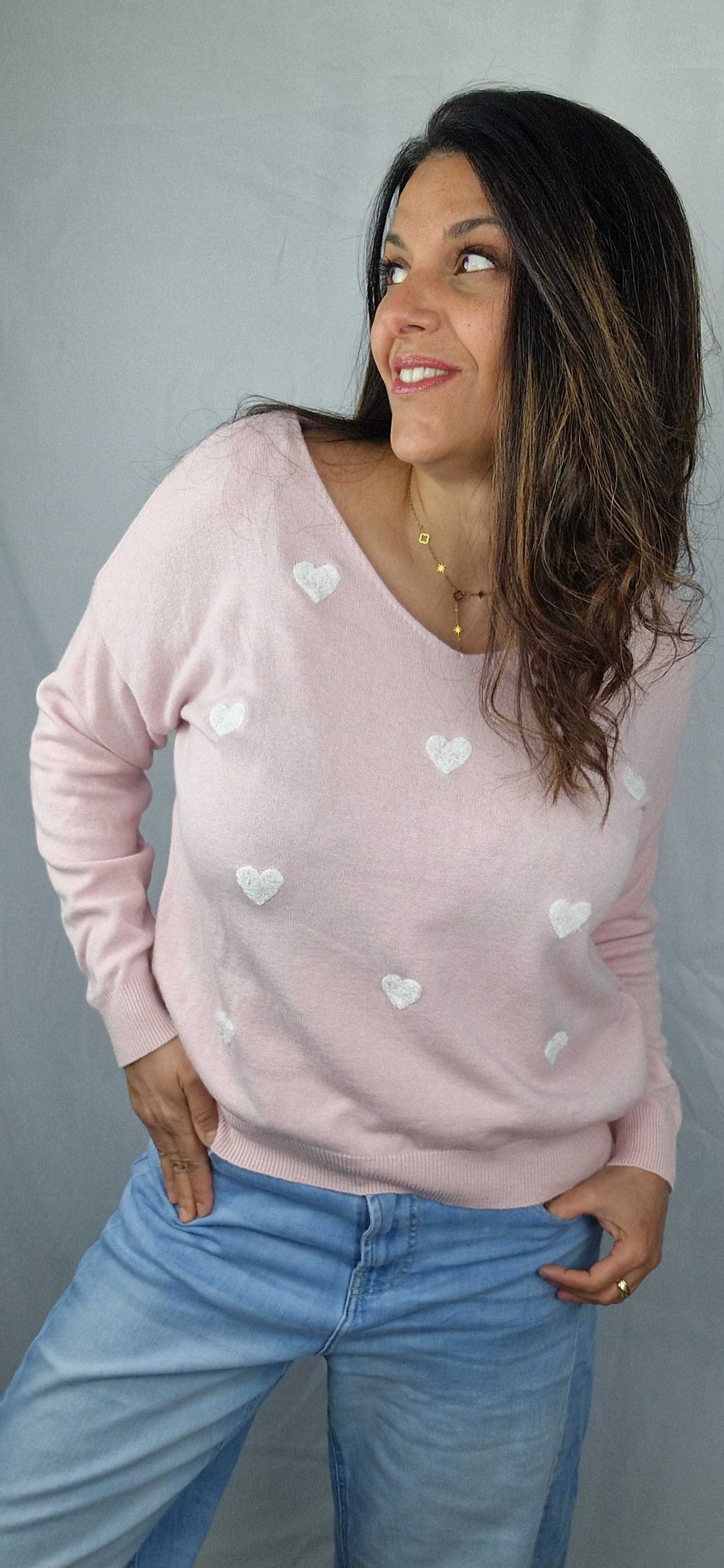 Pull rose femme ave petit coeur blanc 
